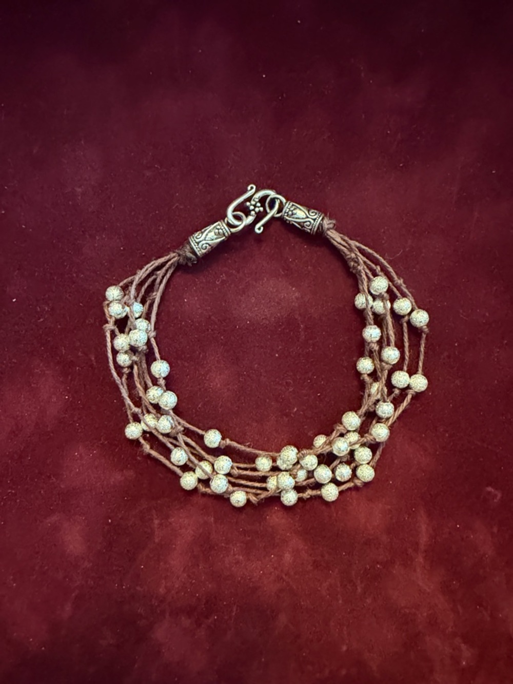 Multi-Strand Brown Cord Bracelet with Sparkling Silver Beads